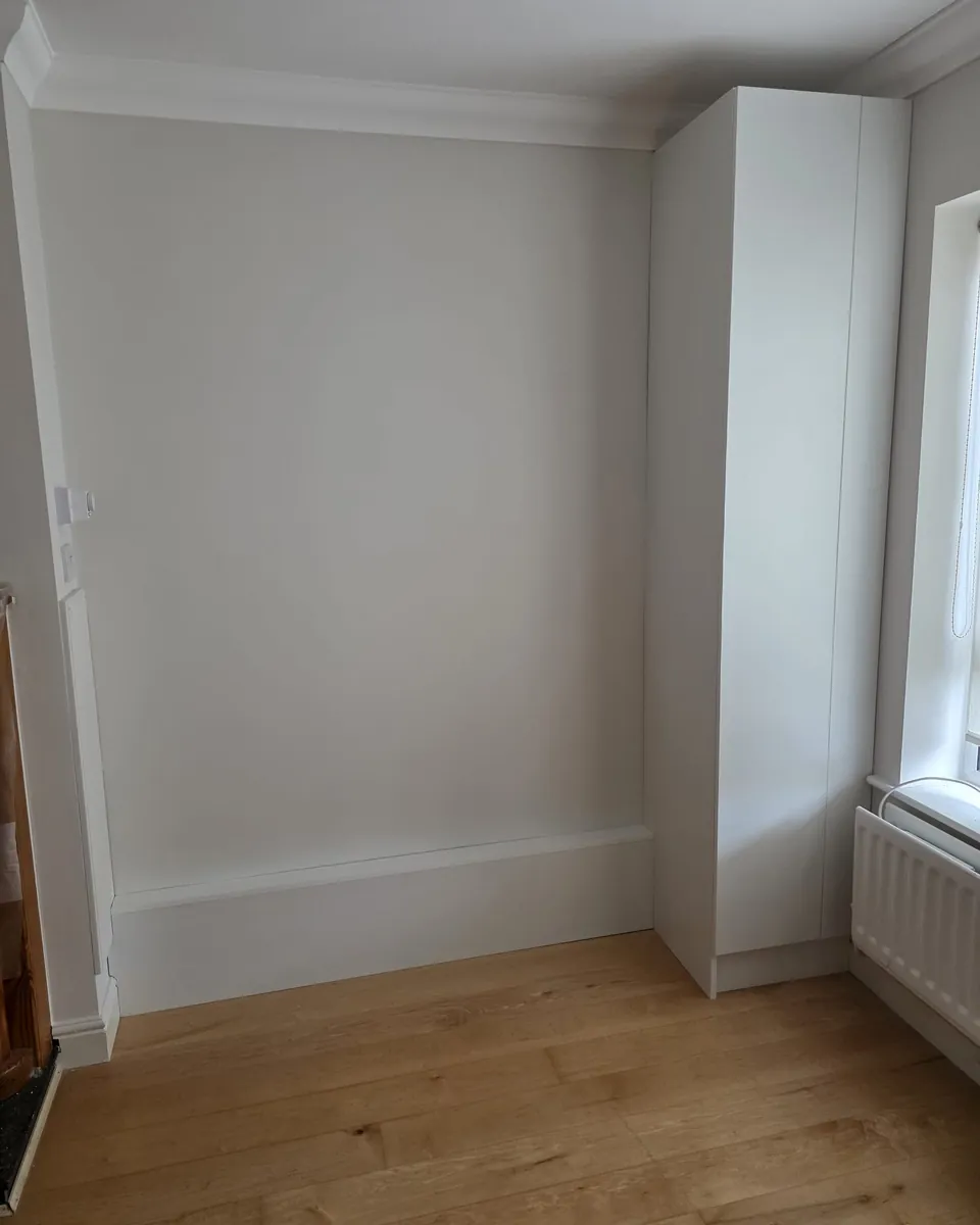 Compact utility room alcove prepared for bespoke fitted storage